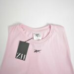 تاپ ورزشی صورتی زنانه Reebok