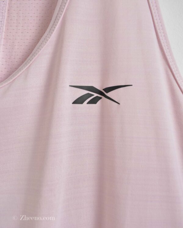 تاپ ورزشی زنانه گلبهی Reebok