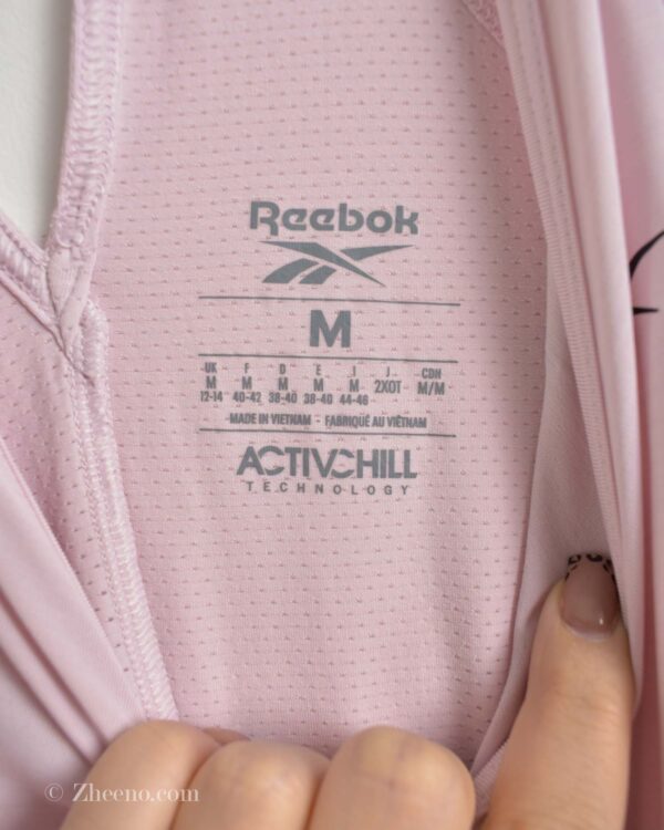 تاپ ورزشی زنانه گلبهی Reebok