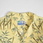پیراهن هاوایی مردانه زرد طرح برگ RJC