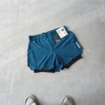 شلوارک دو لایه سبز کبریتی رنگ تیره Crivit