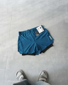 شلوارک دو لایه سبز کبریتی رنگ تیره Crivit