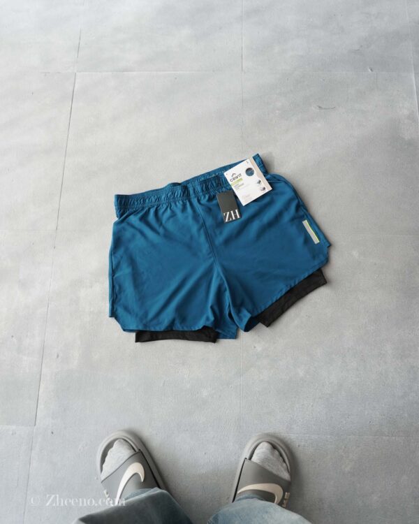 شلوارک دو لایه سبز کبریتی رنگ تیره Crivit