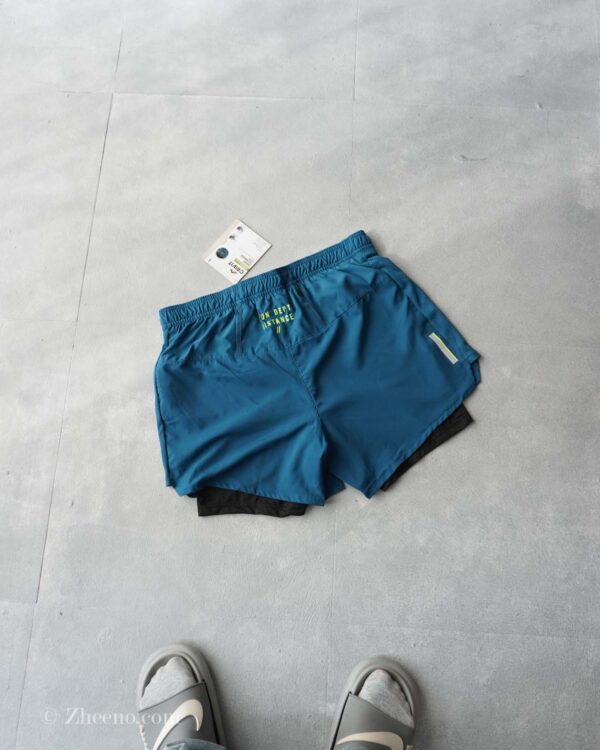 شلوارک دو لایه سبز کبریتی رنگ تیره Crivit