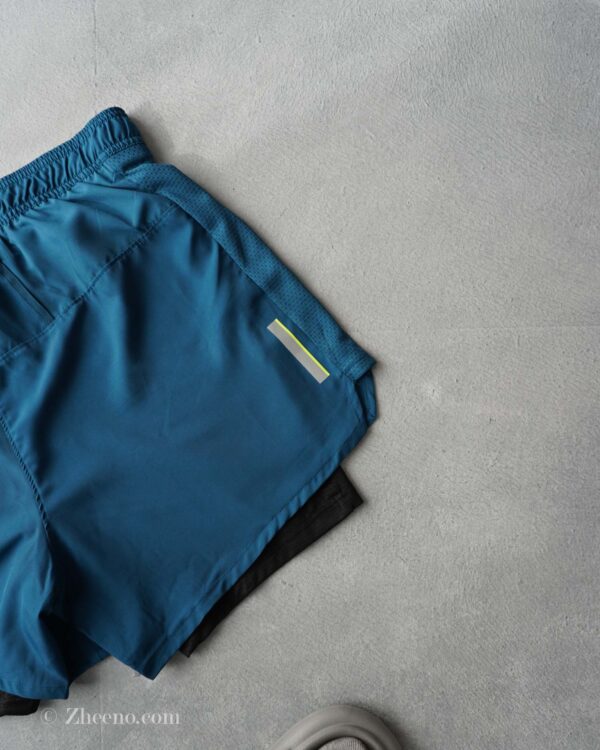 شلوارک دو لایه سبز کبریتی رنگ تیره Crivit